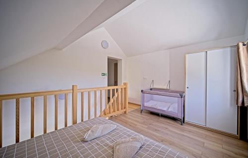a bedroom with a bed and a sink at Holiday Home Lipa by Villas Guide in Ivančići