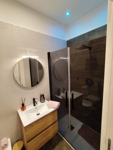 a bathroom with a sink and a shower at Casa Borgo&Mare - Barletta in Barletta
