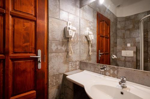 Kúpeľňa v ubytovaní Renegade Hotel