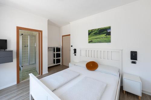 Postel nebo postele na pokoji v ubytování Gasthof Salurn