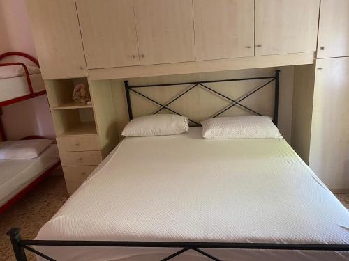 Postel nebo postele na pokoji v ubytování Casa Vista Mare Circeo