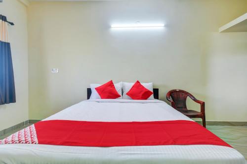 Katil atau katil-katil dalam bilik di Hotel O Aruthraa Residency