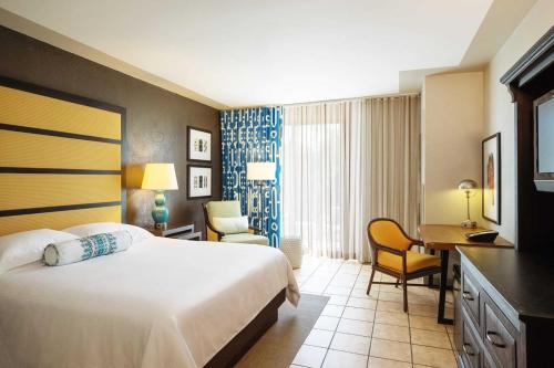 Postel nebo postele na pokoji v ubytování Wyndham Grand Rio Mar Rainforest Beach and Golf Resort