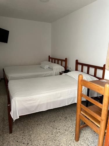 Arenas Hotelにあるベッド