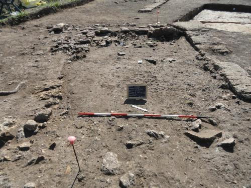 a hole in the ground with two baseball bats at Le Grotte di Sileno in Castellaneta