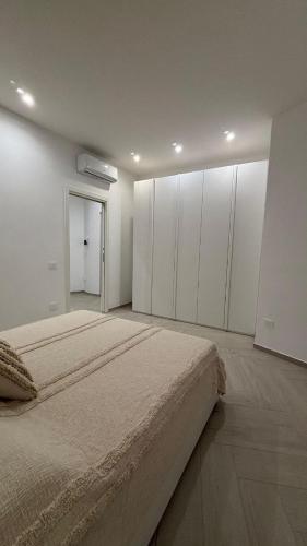 Ένα ή περισσότερα κρεβάτια σε δωμάτιο στο House MALÙ