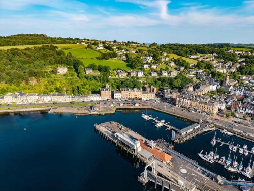 an aerial view of a harbor with boats in the water at Lady Mary Sea View in Rothesay