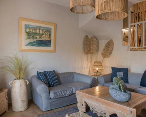 a living room with a couch and a coffee table at Magnificent Kefalonia Villa Villa Chalker 3 Bedrooms Seafornt Spectacular Sea Views Private Outdoor Pool Assos in Asos