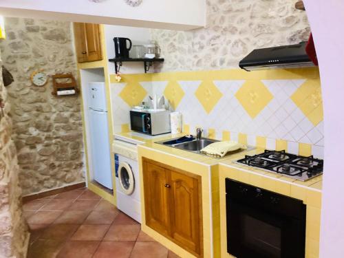 Kuchyň nebo kuchyňský kout v ubytování Casa vacanza, Vacanties Domina