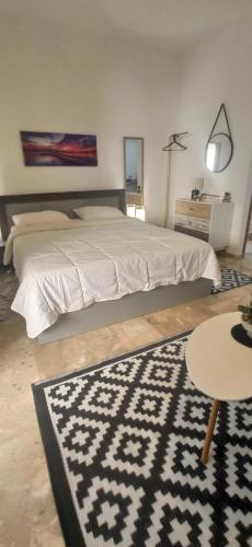 Ένα ή περισσότερα κρεβάτια σε δωμάτιο στο Litsa Panos cozy studio Potidea