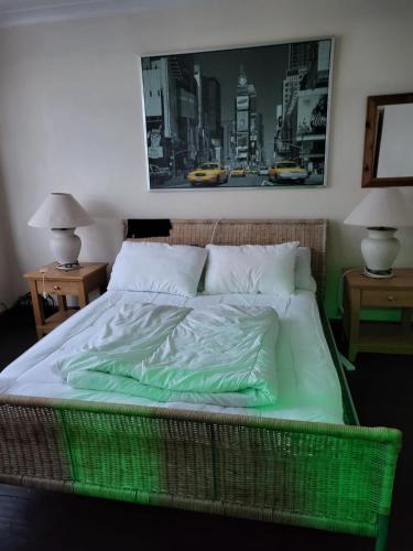 Postel nebo postele na pokoji v ubytování Cozy Guest House
