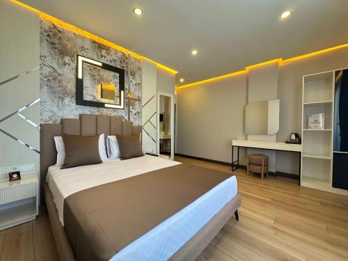 Ένα ή περισσότερα κρεβάτια σε δωμάτιο στο Fourpoints Airport Hotel