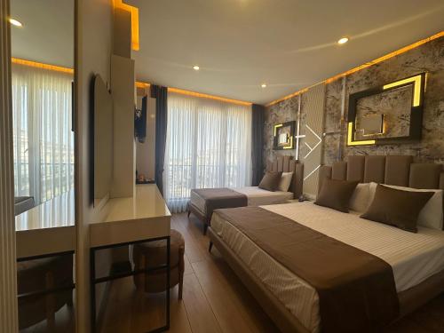 Ένα ή περισσότερα κρεβάτια σε δωμάτιο στο Fourpoints Airport Hotel