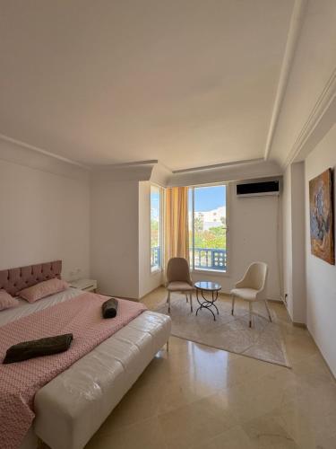 Postel nebo postele na pokoji v ubytování Seaside Luxury Apartment
