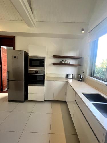 Η κουζίνα ή μικρή κουζίνα στο Luxury Suite La Balise Marina