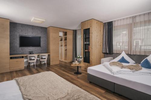 Voodi või voodid majutusasutuse Hotel Ferienglück toas