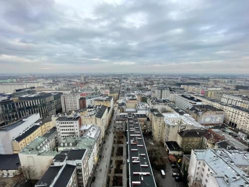 an aerial view of a city with cars at Fantastic-Inn Warszawa - CH35 in Warsaw