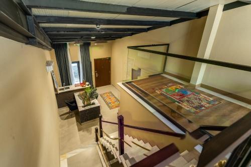 an overhead view of a staircase in a building at FortuNorth in Skardu