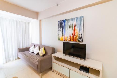 OZPED Flats Particulares Edifício Saint Moritzにあるテレビまたはエンターテインメントセンター