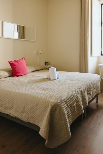 Postel nebo postele na pokoji v ubytování Lisb'on Hostel
