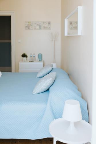Postel nebo postele na pokoji v ubytování Lisb'on Hostel