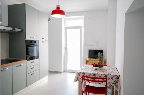 Kuchyň nebo kuchyňský kout v ubytování Domus Picena - Appartamento al mare