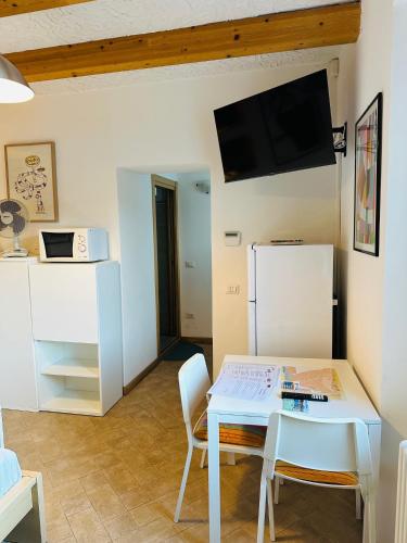 TV a/nebo společenská místnost v ubytování Casa Vittoria