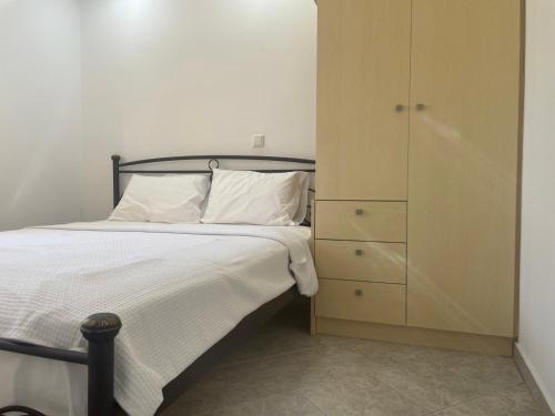 Ένα ή περισσότερα κρεβάτια σε δωμάτιο στο SeaSummerSand Apartment