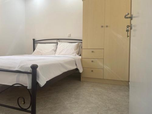 Ένα ή περισσότερα κρεβάτια σε δωμάτιο στο SeaSummerSand Apartment