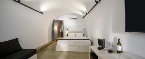 Postel nebo postele na pokoji v ubytování Domus Pyrgos