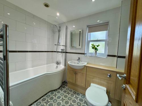 Vannituba majutusasutuses Rawes Cottage Kendal