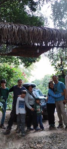 a group of people standing under a bridge at Mirador Jungle El Macuti in Rurrenabaque