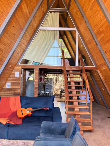 Χώρος καθιστικού στο Cabana dos Sonhos!A frame house Chalé Experience!