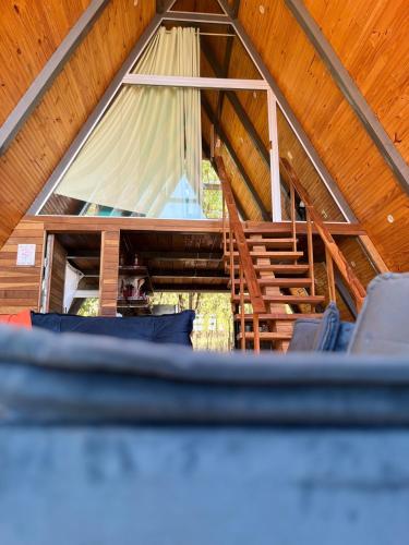 Χώρος καθιστικού στο Cabana dos Sonhos!A frame house Chalé Experience!