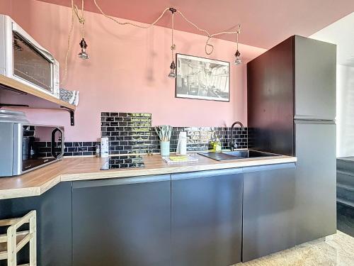 Η κουζίνα ή μικρή κουζίνα στο Appartement Veyre-Monton
