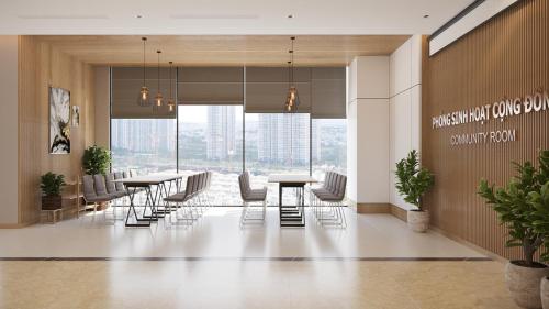 a conference room with tables and chairs and windows at Căn hộ Master có sofa giường view sông Đồng Nai in Long Bình