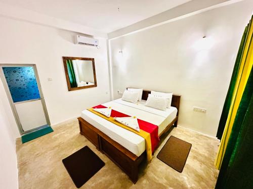 Postel nebo postele na pokoji v ubytování Otara Garden