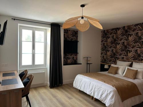 Katil atau katil-katil dalam bilik di Appart-Hôtel Rouillac