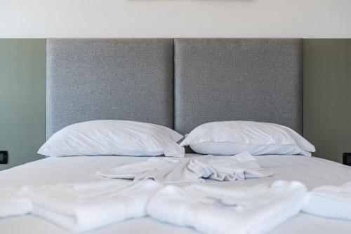 Cama o camas de una habitación en Hotel Kompleks Joni