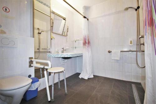a bathroom with a toilet and a sink at Gästehaus Centro in Konstanz in Konstanz