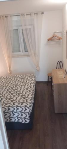 Postel nebo postele na pokoji v ubytování Serra e Mar