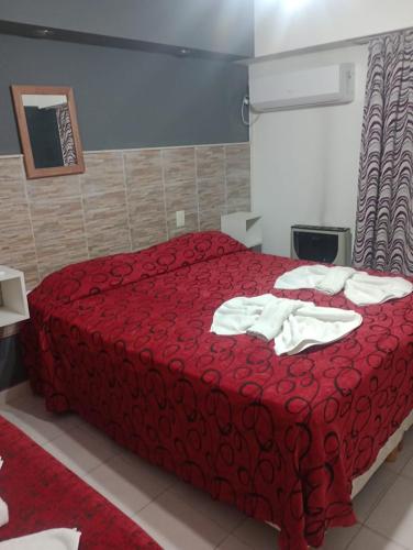 Ένα ή περισσότερα κρεβάτια σε δωμάτιο στο Glicinas