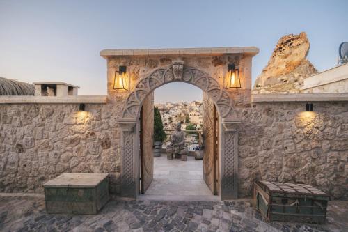 an entrance to a stone building with an archway at Vie Cappadocia - Adults Only in Nevsehir