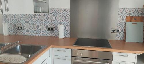 Η κουζίνα ή μικρή κουζίνα στο Aasee Apartments