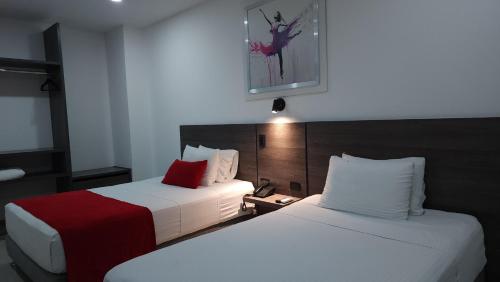 Una cama o camas en una habitación de BCA HOTEL
