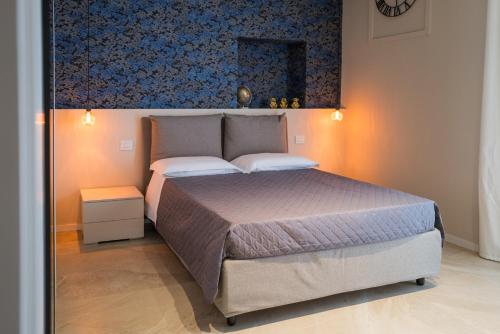 Postel nebo postele na pokoji v ubytování B&B Nonna Rosa - Via Castellucci