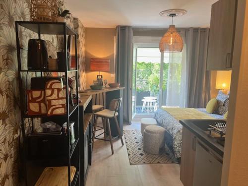 Una cocina o cocineta en Petit Cocon des Rives Proche Stanislas