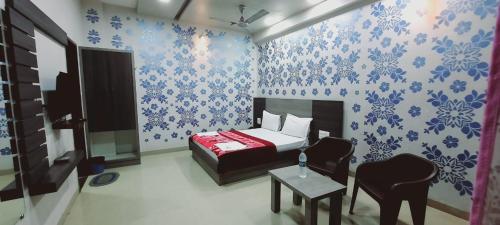 Μια τηλεόραση ή/και κέντρο ψυχαγωγίας στο Hotel Kavita Inn