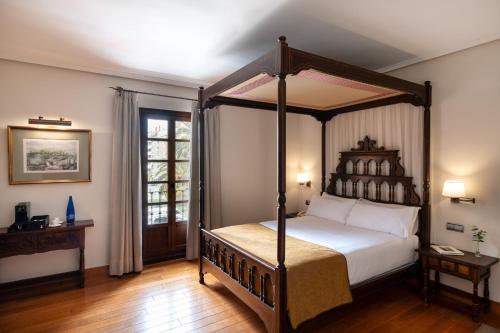 Posteľ alebo postele v izbe v ubytovaní Parador de Calahorra