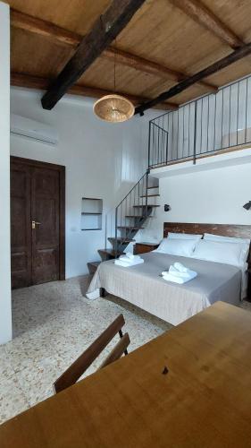 Postel nebo postele na pokoji v ubytování Selice 9 B&B